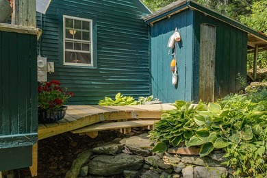 Humming with happiness, this year-round cottage-style home - photo 32