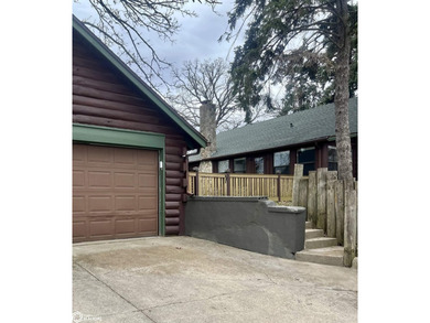 This charming cabin-style home has been completely redone and is - photo 5