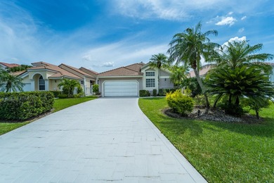 Welcome to Eastpointe Country Club. This large family home sits - photo 1