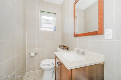 Welcome to this fully detached home in Midland Beach. The first - photo 11