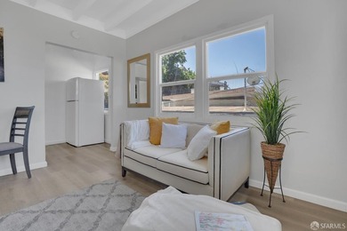 This well-maintained triplex presents a rare opportunity to own - photo 14