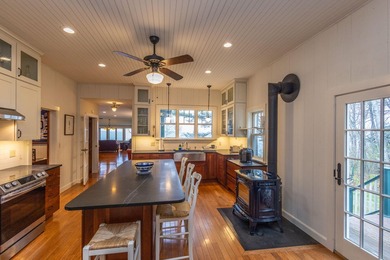 Perched above the shores of Penobscot Bay in Northport, this - photo 16