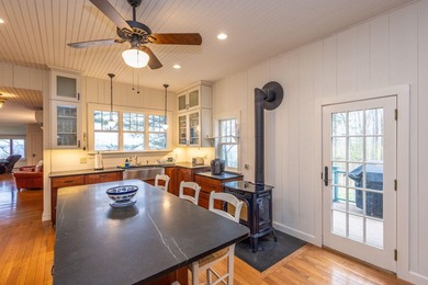 Perched above the shores of Penobscot Bay in Northport, this - photo 21