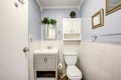 This stunning and meticulously maintained all-brick two-family - photo 11