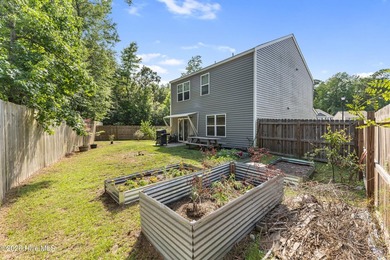 Welcome to 9363 Vineyard Grove Lane NE in Vineyard Grove! Built - photo 29