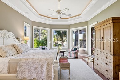 Tranquil waterfront views set the tone for this custom H2-built - photo 32