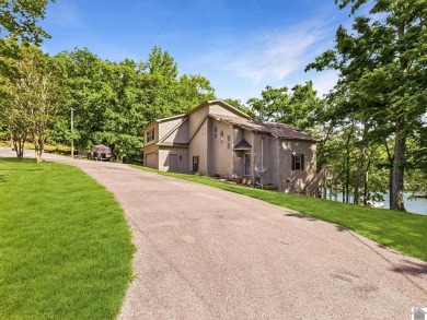 Discover serene lakefront living at 21 Heron Point, a - Lake Home For Sale in Cadiz, Kentucky