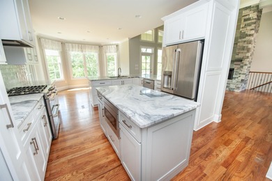 This waterfront home is special. Newer style home with formal - photo 3
