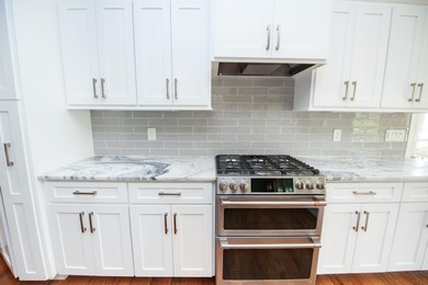 This waterfront home is special. Newer style home with formal - photo 4