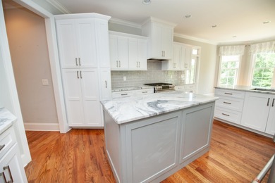 This waterfront home is special. Newer style home with formal - photo 5