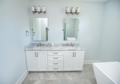 This waterfront home is special. Newer style home with formal - photo 10