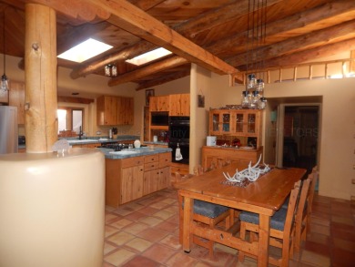 True Adobe style home in prestigious Alto Lakes Golf and Country