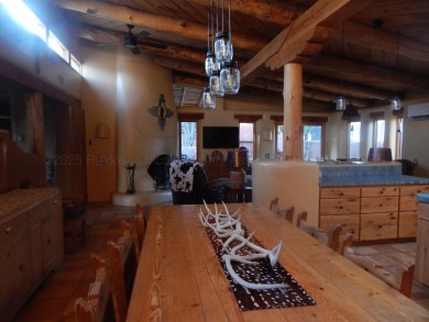 True Adobe style home in prestigious Alto Lakes Golf and Country