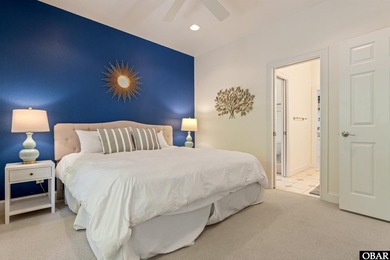 Tucked inside the gates of The Currituck Club, this six-bedroom - photo 11