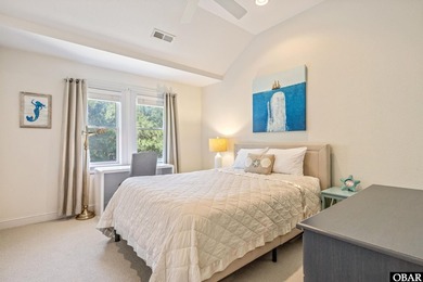 Tucked inside the gates of The Currituck Club, this six-bedroom - photo 12
