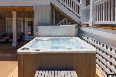 Tucked inside the gates of The Currituck Club, this six-bedroom - photo 13