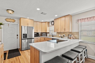 Discover relaxed coastal living in this beautifully renovated - photo 3