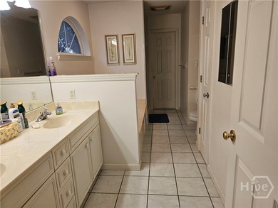Brick home with tidal creek wrapping around back and side of - photo 14