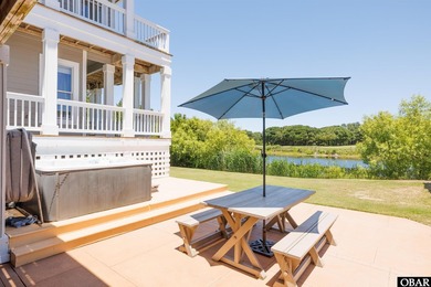 Tucked inside the gates of The Currituck Club, this six-bedroom - photo 14