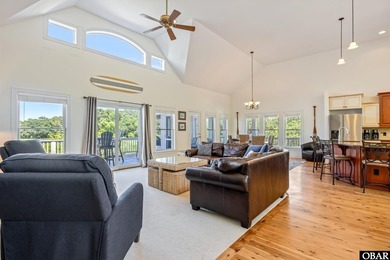 Tucked inside the gates of The Currituck Club, this six-bedroom - photo 18