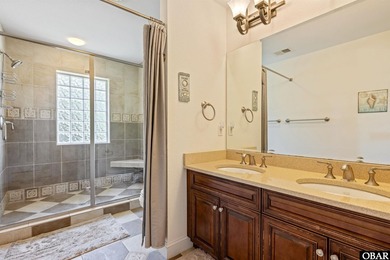 Tucked inside the gates of The Currituck Club, this six-bedroom - photo 19