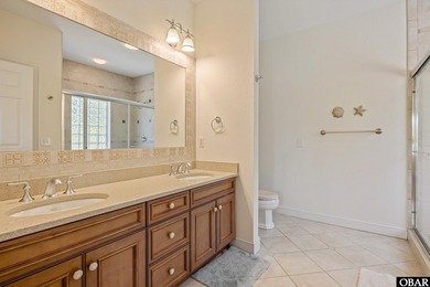 Tucked inside the gates of The Currituck Club, this six-bedroom - photo 20