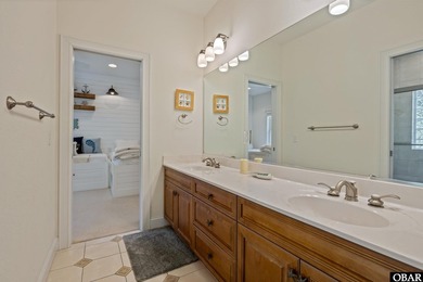 Tucked inside the gates of The Currituck Club, this six-bedroom - photo 23