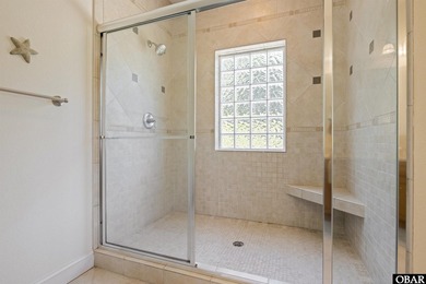 Tucked inside the gates of The Currituck Club, this six-bedroom - photo 24