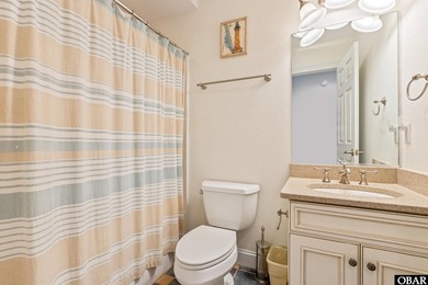 Tucked inside the gates of The Currituck Club, this six-bedroom - photo 25