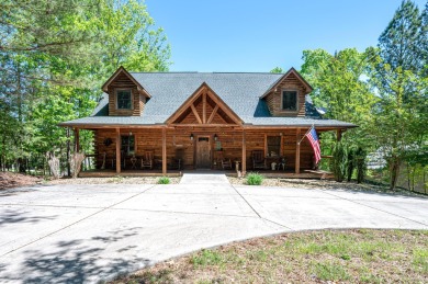Smith Lake (Ryan Creek) A true log cabin tucked away in a - Lake Home For Sale in Bremen, Alabama