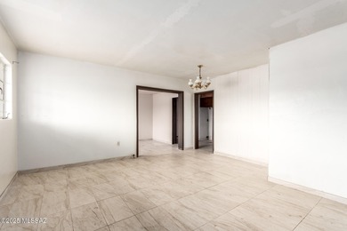 Welcome to an incredible opportunity at 418 E Roger Rd - a solid