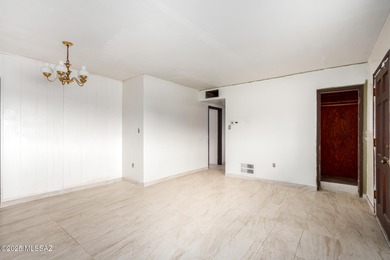 Welcome to an incredible opportunity at 418 E Roger Rd - a solid