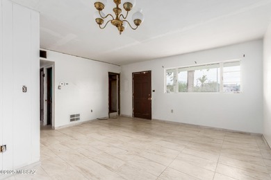 Welcome to an incredible opportunity at 418 E Roger Rd - a solid