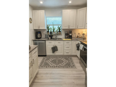 This spacious single-family home offers nearly 2,400 sq ft of - photo 6