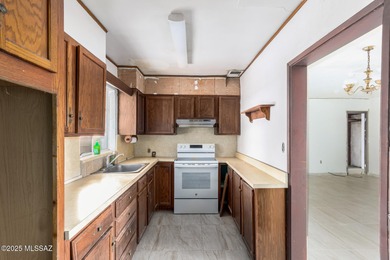 Welcome to an incredible opportunity at 418 E Roger Rd - a solid