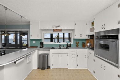 This 2-BD 2-BA 1,200-sq-ft home on a .28-acre lot w/ 90 ft of - photo 12