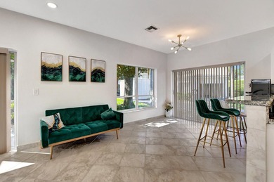 Welcome to 7363 Panache Way at Boca Pointe! This remodeled 4