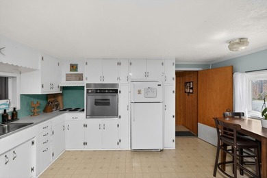 This 2-BD 2-BA 1,200-sq-ft home on a .28-acre lot w/ 90 ft of - photo 14