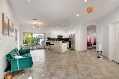 Welcome to 7363 Panache Way at Boca Pointe! This remodeled 4