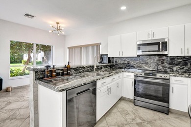 Welcome to 7363 Panache Way at Boca Pointe! This remodeled 4