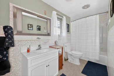 This 2-BD 2-BA 1,200-sq-ft home on a .28-acre lot w/ 90 ft of - photo 17