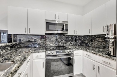 Welcome to 7363 Panache Way at Boca Pointe! This remodeled 4