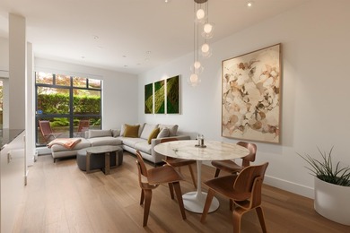 Welcome to Treo at Arbutus Walk. Listed as a 2-bedroom, this - photo 2