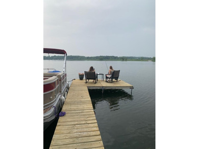 This 2-BD 2-BA 1,200-sq-ft home on a .28-acre lot w/ 90 ft of - photo 32