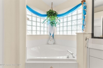 Discover serene lakeside living in this inviting 4-bedroom - photo 34