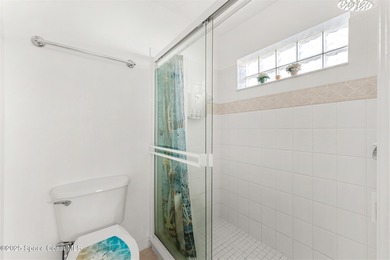 Discover serene lakeside living in this inviting 4-bedroom - photo 35