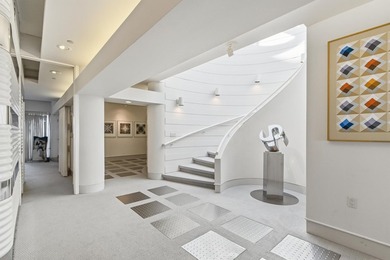 Architect-owned dual-level penthouse offers a serene retreat - photo 13