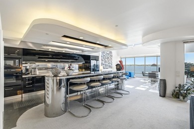 Architect-owned dual-level penthouse offers a serene retreat - photo 15