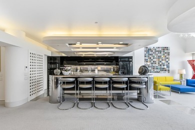 Architect-owned dual-level penthouse offers a serene retreat - photo 16