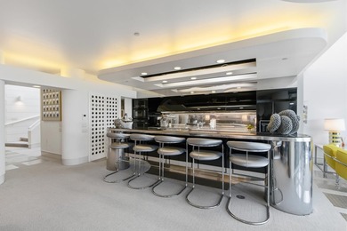 Architect-owned dual-level penthouse offers a serene retreat - photo 17